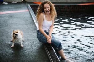 Why Your Dog Comes Running When You Laugh (They May Be Responding to More Than the Sound of Your Voice)